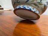 a bowl that is sitting on a wooden table