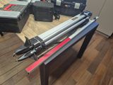 a table with a bunch of tools on top of it