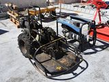 a tractor with a trailer attached to it in a parking lot