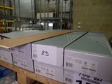several boxes are stacked on a pallet in a warehouse