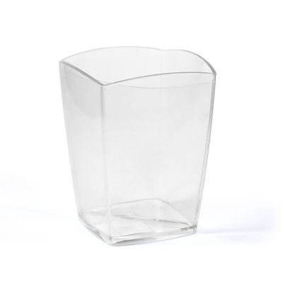 a glass vase that is sitting on a white surface