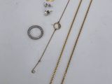 a collection of jewellery including a necklace, bracelet and ring