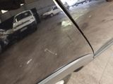 a reflection of a car in the side mirror of a car