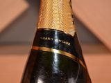 a bottle of champagne that is sitting on a table