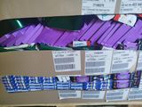 a cardboard box with a lot of candy on it