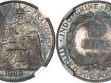 a close up of a silver coin with a woman on it