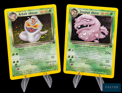 two pokemon cards are shown on a black background
