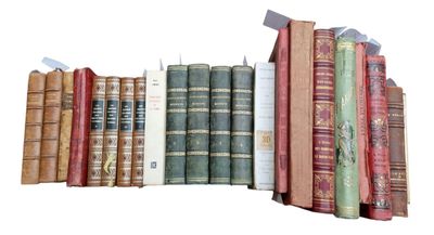 many old books stacked on top of each other