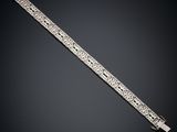 a diamond bracelet, by cartier