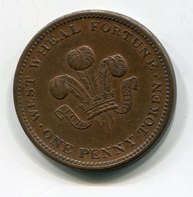 une vieille pièce de monnaie représentant un homme et une femme