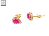 a close up of a pair of pink earrings on a white background