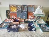 many different types of stuffed animals in boxes on the floor