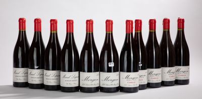 six bottles of red wine are lined up in a row