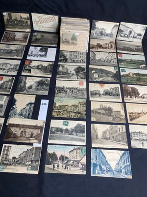 several old postcards of different types and sizes on a table