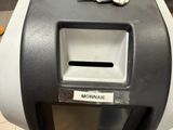 a close up of a paper towel dispenser in a public restroom