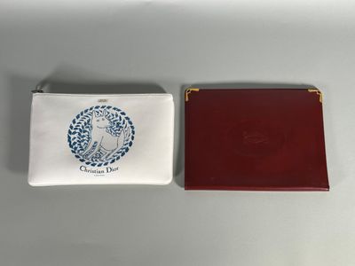 an image of a red and white purse next to a blue and white coin