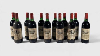 six bottles of wine are lined up in a row on a white surface