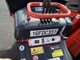 a close up of a forklift with a number plate on it