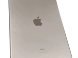 an apple ipad sitting on top of a table with a white background