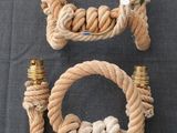 two pieces of rope wrapped in a knot on top of a table