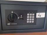a safe box on a desk in a room
