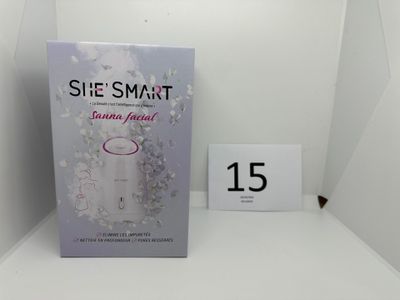 a white shelf with a book on top of it next to a calendar