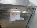 a piece of paper taped to the door of a dishwasher