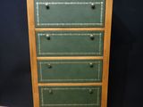 an image of a green chest of drawers