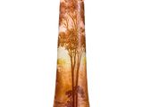 a vase that has a picture of a tree on it