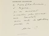 a black and white photo of a handwritten letter on a piece of paper