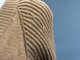 a close up of a sweater with a long sleeve