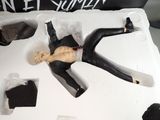 a cake with a figure of a man laying on it