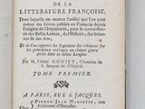 an open book with a picture of a bird on it