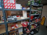 a shelf with many different items on it in a garage