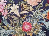 an image of a floral print scarf hanging on a wall