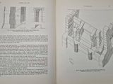 an open book with a drawing of a building inside of it