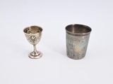 silver goblet and cup on a white background