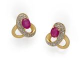 a pair of ruby and diamond earrings