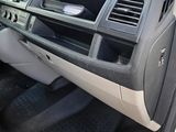 the interior of a car with a steering wheel and dashboard controls