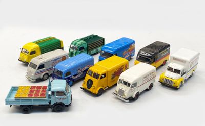 a lot of toy trucks that are lined up together