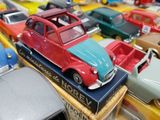 many toy cars that are sitting on top of each other