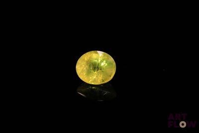 a yellow diamond in the dark