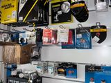 many different items on the wall in this garage
