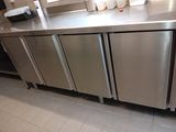 a stainless steel counter in a commercial kitchen