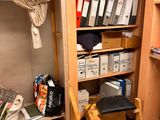 a closet full of files and other items in the room