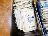 a box full of old records sitting on a table