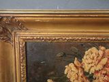 a picture of a painting of flowers in a gold frame