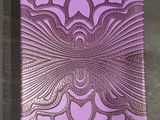 a purple wallet with an intricate design on it