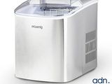 a close up of a small ice maker on a white background