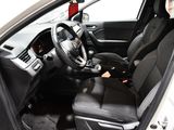 the interior of a car with a steering wheel and a dashboard